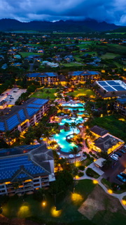 Twilight aerial over the pools at Koloa Landing, Kauai